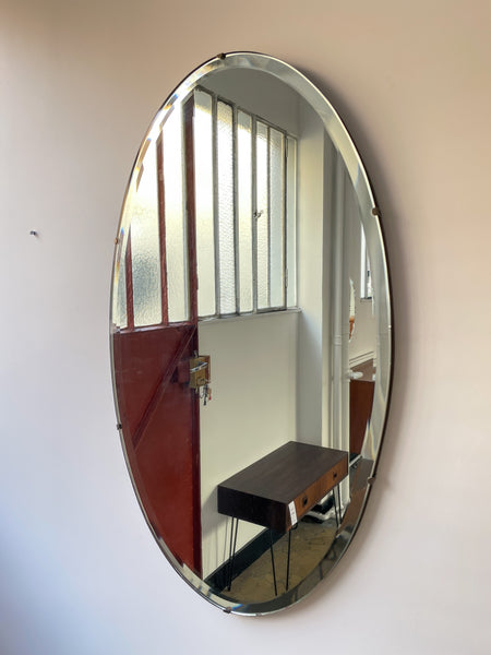 Grand miroir oval biseauté